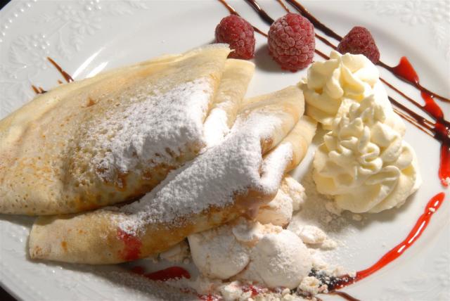 Panqueque con dulce de leche en El Nacional Restaurant de Fuegos