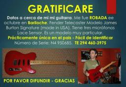 Atenci&oacute;n Gratificanr&aacute;n a quien devuelva esta guitarra